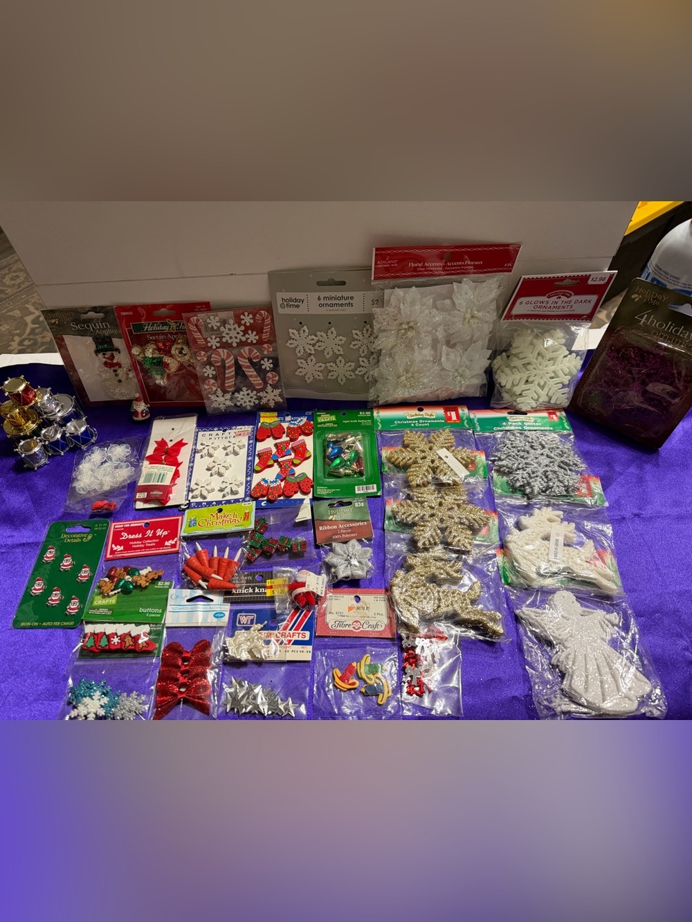 Assortment of holiday craft embellishments